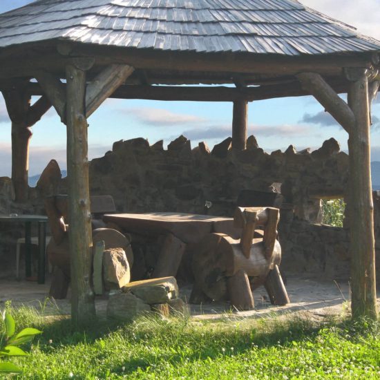 Gazebo with stone walls